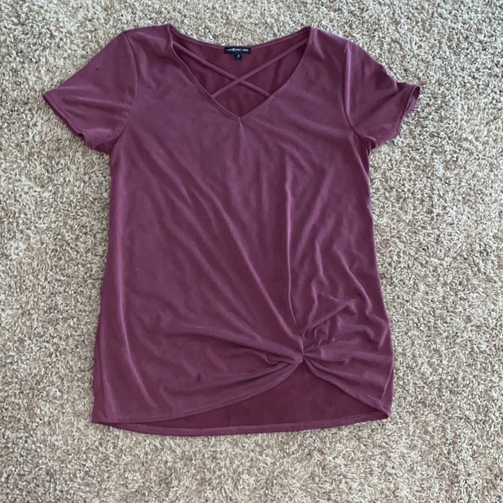 Cute burgundy blouse with cross pattern on top and twisted knot at the bottom